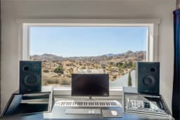 Songwriting desk overlooking the desert at ESCAPE Studios