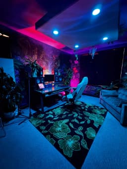 Blue-lit recording setup in the Rainforest Room at Paradise Recording