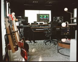 Main recording room with guitars and control desk at Room Key Studios